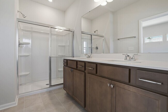 Building Photo - BRAND NEW TOWNHOME-9 FOOT CEILINGS-TWO CAR GARAGE-POOL COMMUNITY