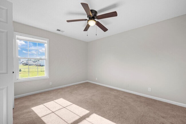 Building Photo - Charming Brick Home with Soaring Ceilings & Updated Finishes!
