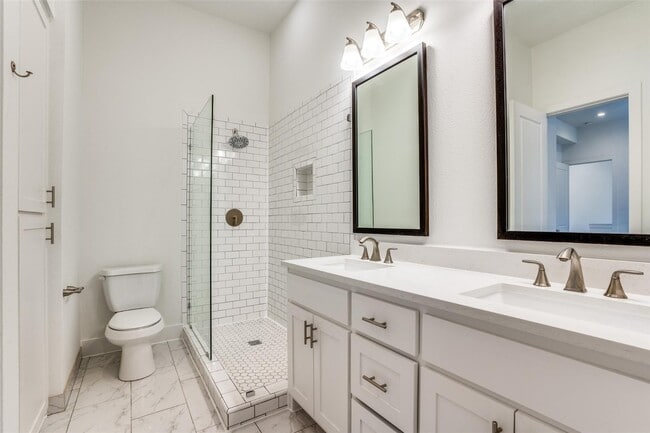 Building Photo - Beautiful townhome featuring granite countertops, hard wood floors, and a small private yard grea...