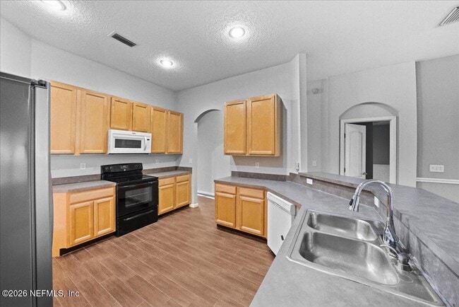 Building Photo - 8871 Canopy Oaks Dr