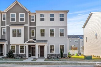 Building Photo - BRAND NEW BEAUTIFUL TOWNHOME IN GROWING AP...