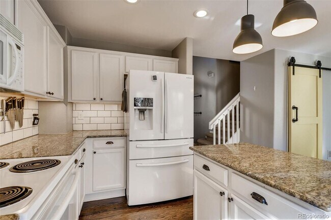 Building Photo - Evolve Real Estate: Upgraded and Stylish Remodel with Solar Panels in Highlands Ranch. Available ...
