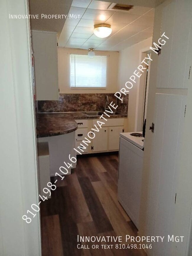 Building Photo - 5181 1/2 N. Elms-#1