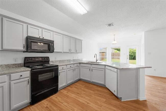 Building Photo - 9825 Tyler Dr