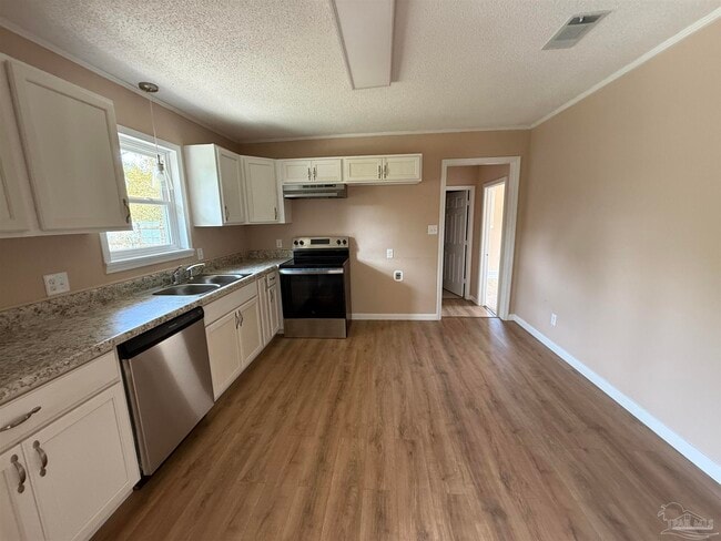 Building Photo - 7845 Le Jeune Dr