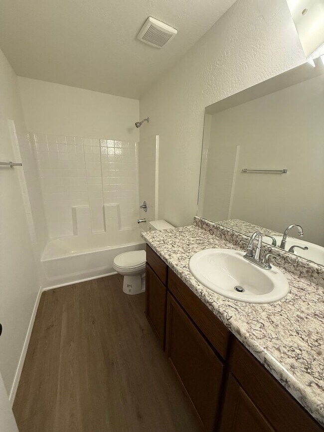 Building Photo - BRAND NEW 4 Bedroom in Desert Sands!