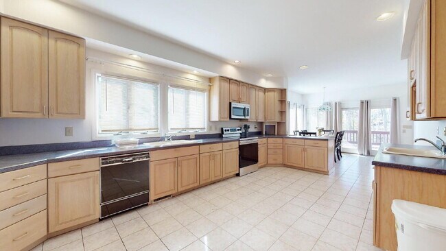 Building Photo - The Mylandia | Beautiful and spacious University City – Charlotte house with a backyard, offering...