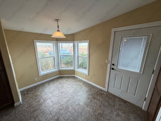 Building Photo - Texico School District - Country Home!