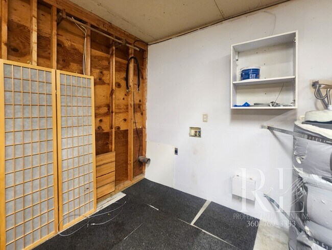 Building Photo - Waterfront Living in Indianola – Dock, Bea...