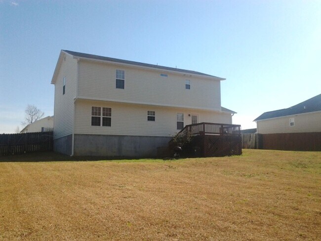Building Photo - Stunning four bedroom two and a half bath home located in Brookstone subdivision. Covered front p...