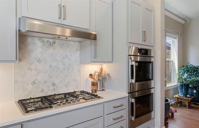 Building Photo - Modern 3BR Home with Finished Basement & Private Courtyard in Lowry