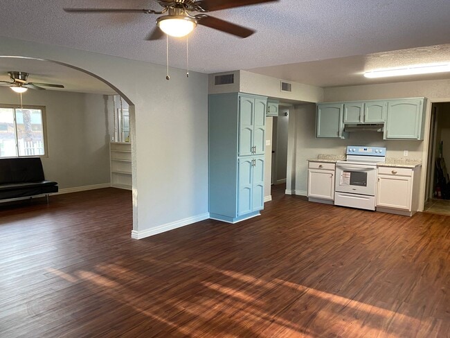 Building Photo - 3 bedroom home with large living room on a large corner lot with lots of room for play.