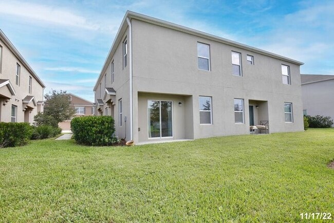 Building Photo - Spacious 3/2.5 Townhome with a 2 Car Garage and a Beautiful Pond View in Westwood Condos - Orlando!