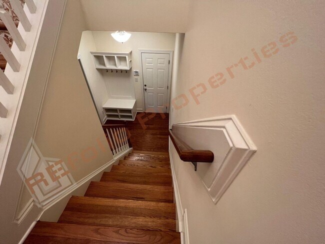 Building Photo - Elegant 3 Story 3 Bedroom Formal Model Tow...