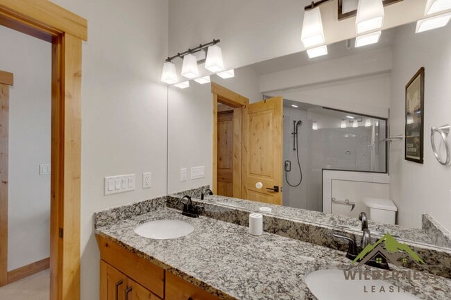 Building Photo - Beautiful Furnished Townhome with infared sauna, finished garage and community amenties