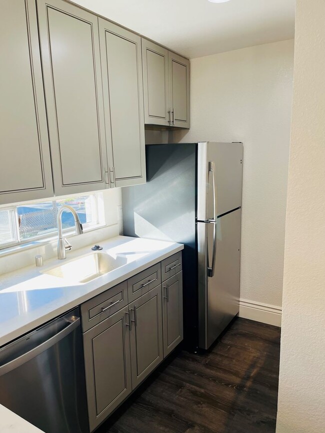 Building Photo - Upper Level Condominium in Station West