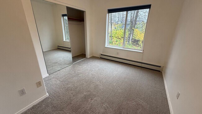 Building Photo - Major Updates! Raised Ranch Style Condo wi...