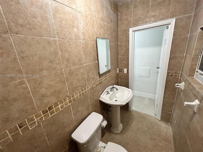 Building Photo - 261 NW 49th St