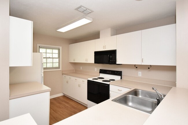 Building Photo - 2BR/2BA Upstairs Condo in Haile Village Center – $1,650/month