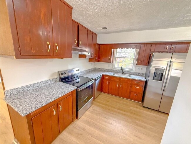 Building Photo - 6485 Carolyn Ct