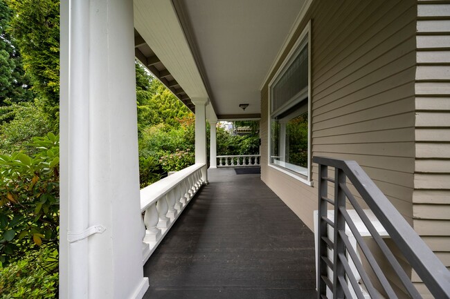 Building Photo - Traditional Four-Corner Craftsman Home on ...