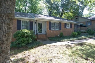 Building Photo - Gorgeous 3 bed 2 bath home with finished basement/carport in NW Greensboro! Lawn care included.