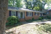 Building Photo - Gorgeous 3 bed 2 bath home with finished basement/carport in NW Greensboro! Lawn care included.