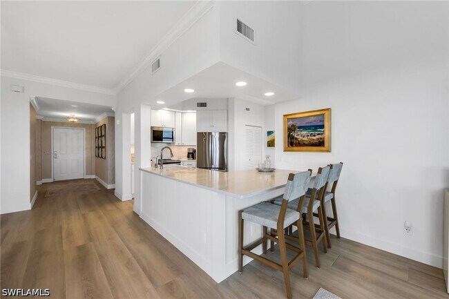 Building Photo - 7040 Pelican Bay Blvd