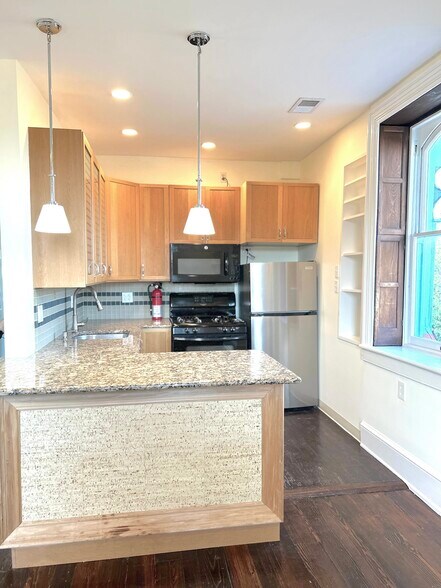 Kitchen- semi open with window - 301 M St NW