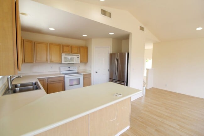 Building Photo - Island Living in Peaceful Piilani Village ...