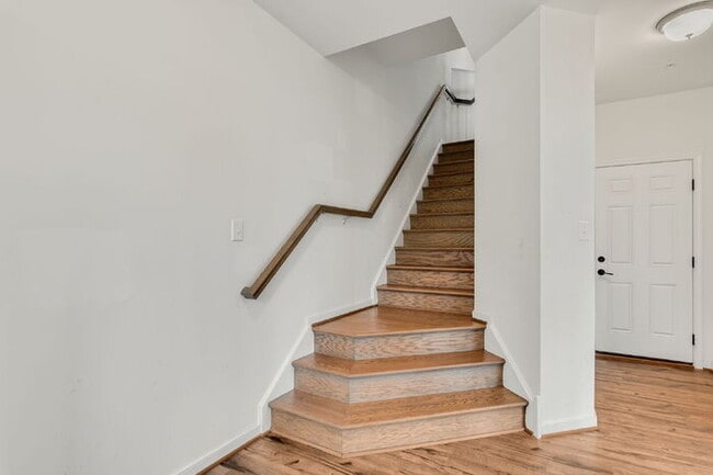 Building Photo - Modern End-Unit Townhome in Rocketts Landing with an Incredible Rooftop Terrace