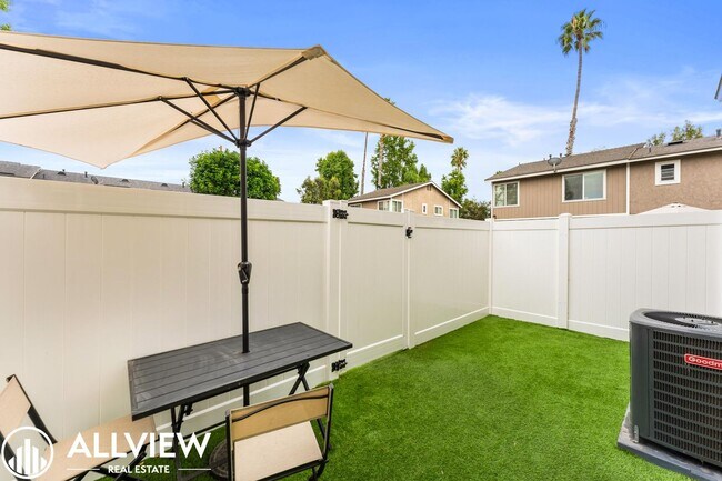 Building Photo - Two-Story Gem in Huntington Beach - Modern Upgrades & Private Outdoor Space