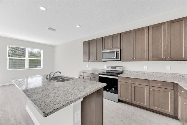 Building Photo - 6321 Tillandsia Pl