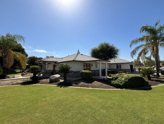 Building Photo - Spacious 4-Bedroom Home on 2.5 Acres with ...