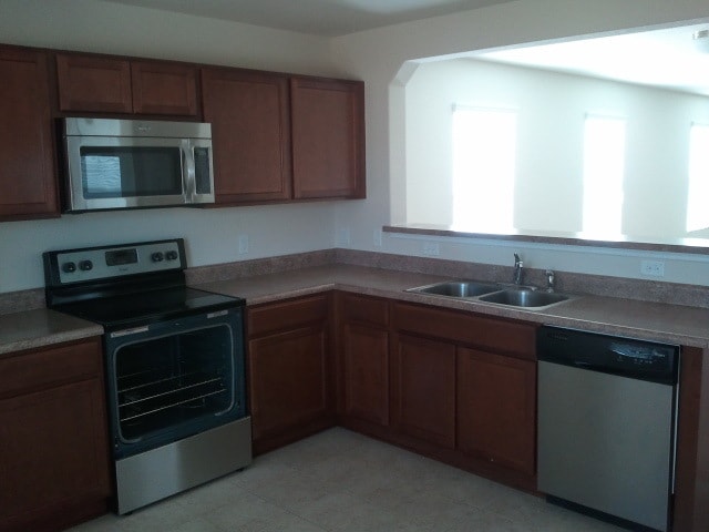 Kitchen into open floor plan - 10910 Burning Lamp