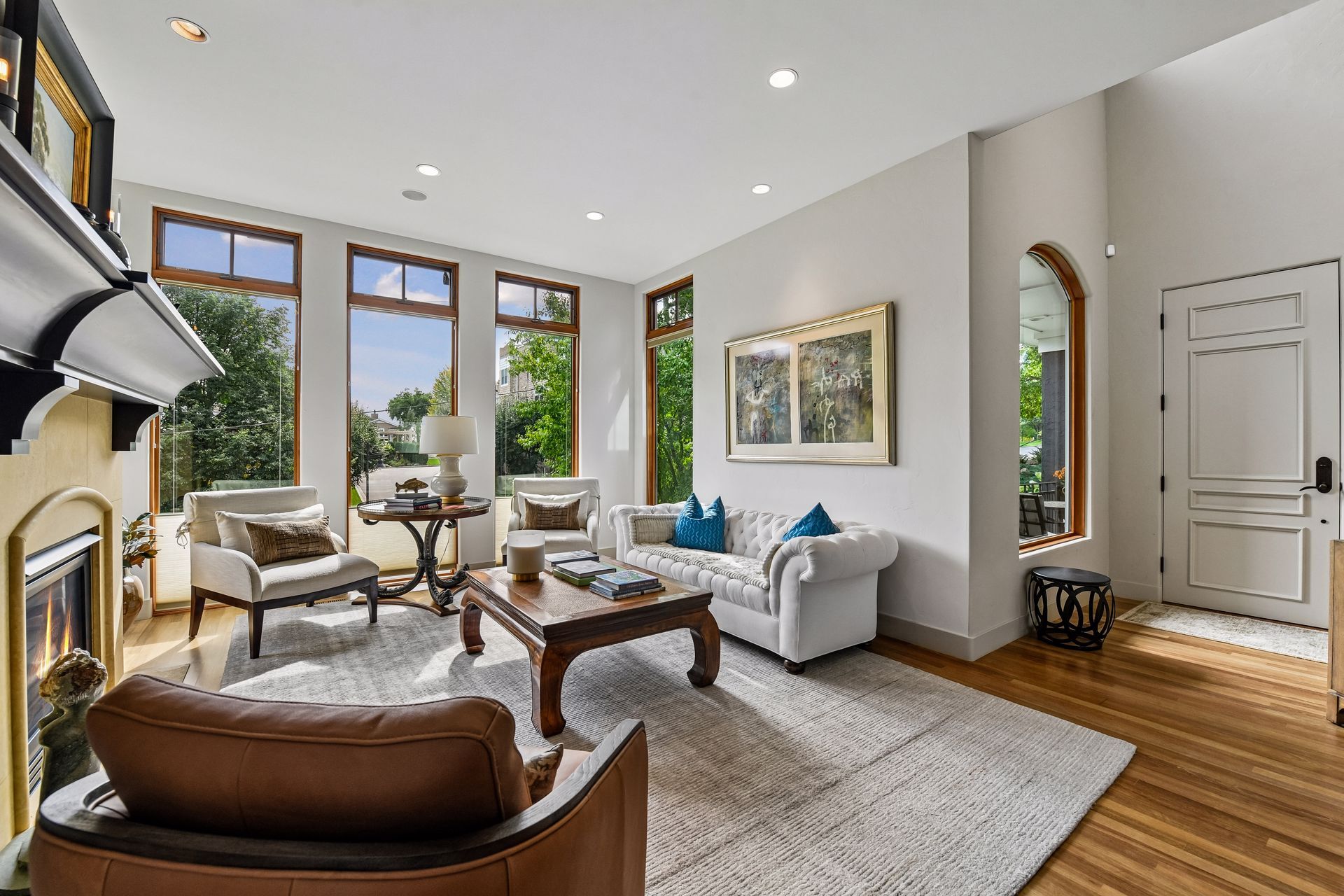 Cozy up by the elegant gas fireplace, the perfect centerpiece for warmth and ambiance - 745 Rice St E