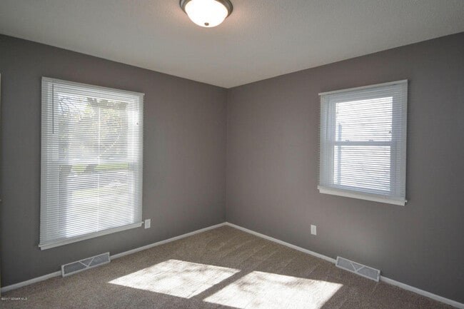 Building Photo - Cape Cod style home - completely updated throughout!