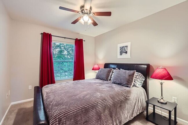 Building Photo - Updated 4-Bedroom with Serene Outdoor Spac...