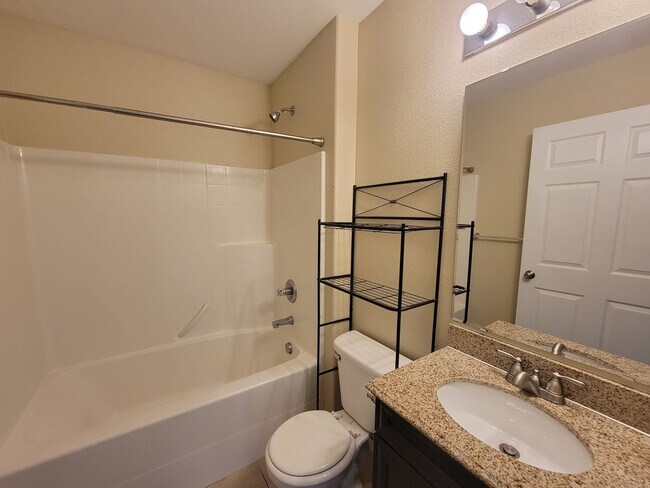 Building Photo - Comfortable 4-Bedroom Home with Fenced Bac...