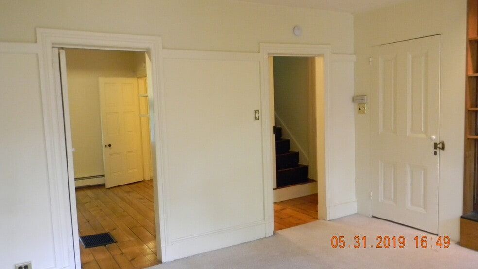 Bedroom toward hallway - 236 W Barnard St