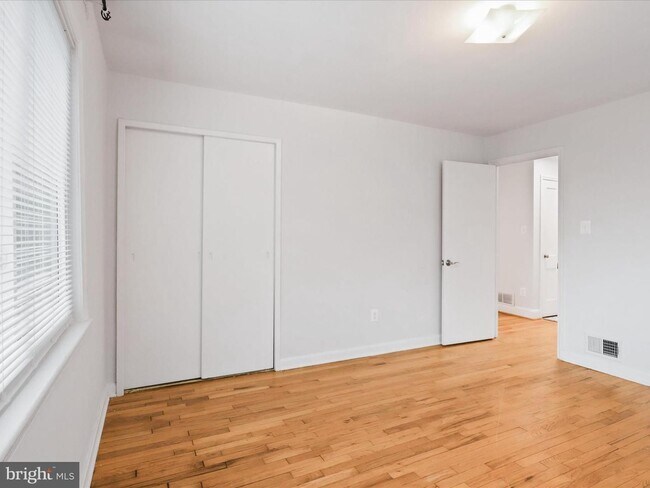 Building Photo - This home blends urban accessibility with peaceful natural surroundings.