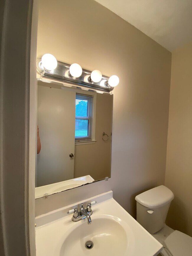 Building Photo - COMING SOON! 4Br, 2.5 baths, large kitchen, large bedrooms, fence, storage and more! N. College R...