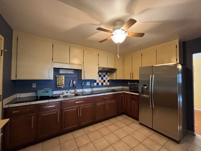 Building Photo - Beautiful Single-Story Townhome on Corner Lot with Private Courtyard & 2-Car Garage