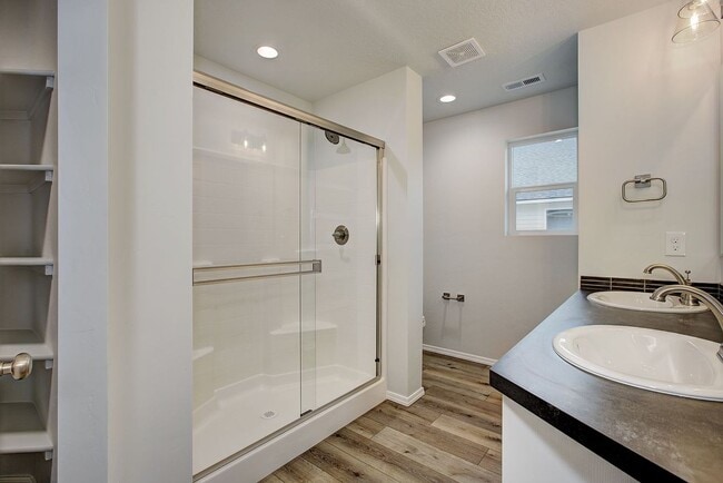 Building Photo - The 3 bedroom, 2 bedroom home also has a f...