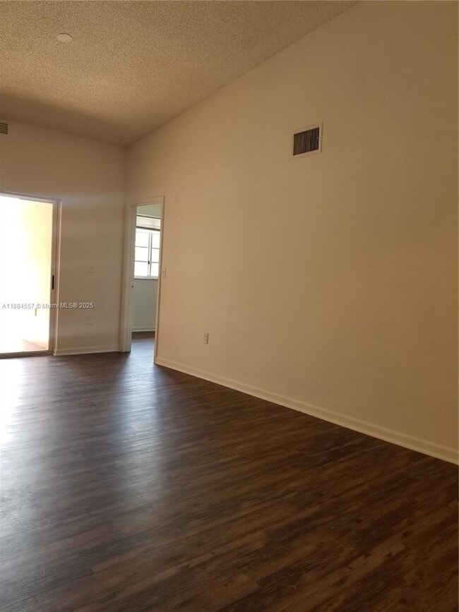 Building Photo - 3211 Sabal Palm Manor