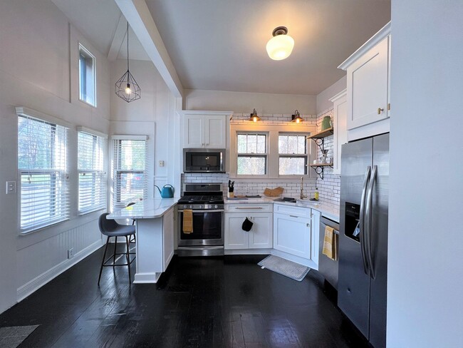 Building Photo - HISTORIC 4TH & GILL BUNGALOW STYLE HOME WITH FRONT PORCH!