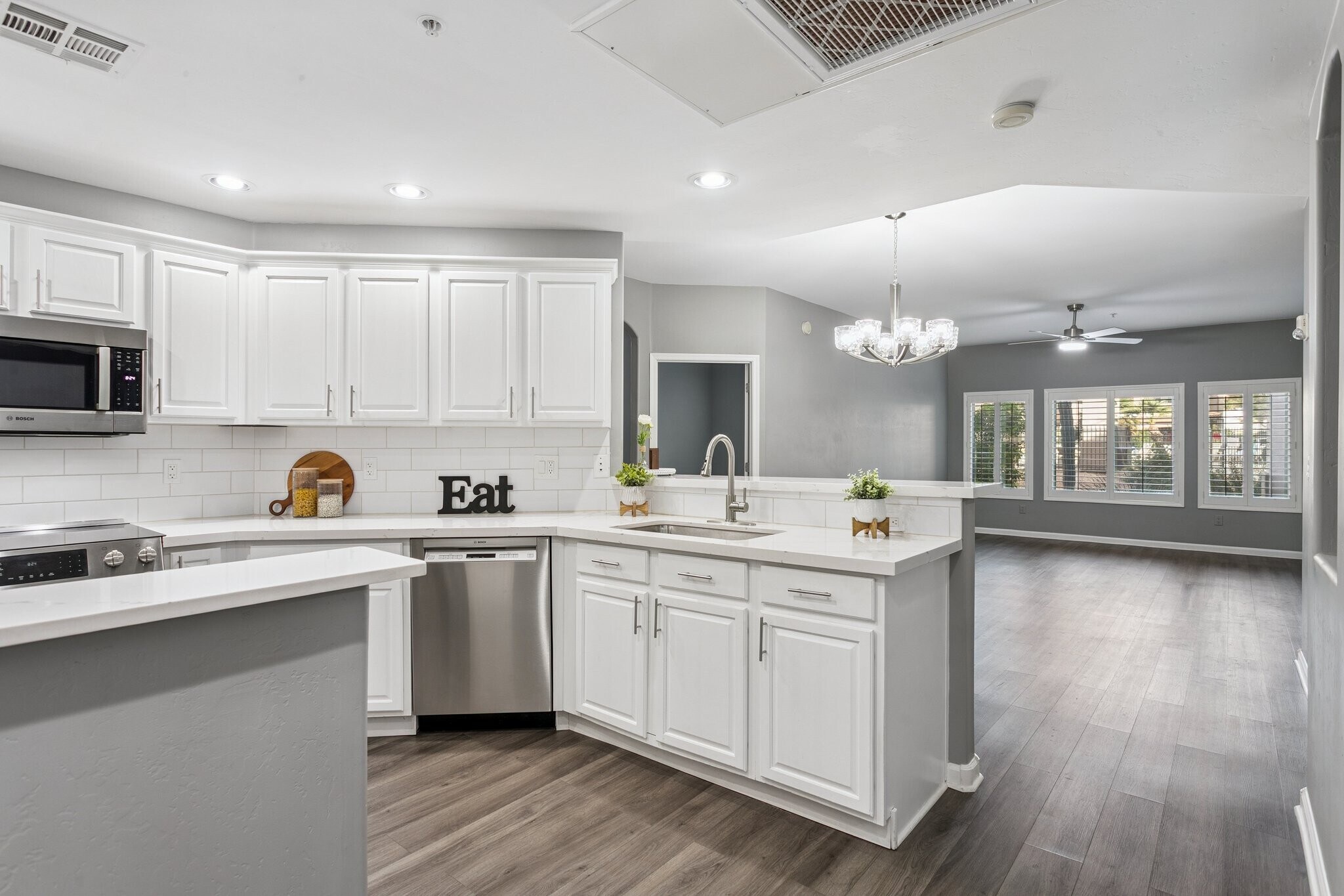 Opens to the great room with luxury vinyl flooring - 14000 N 94th St