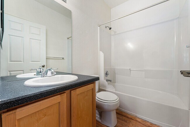 Building Photo - Gorgeous Townhome With 2-Car Garage and Ce...