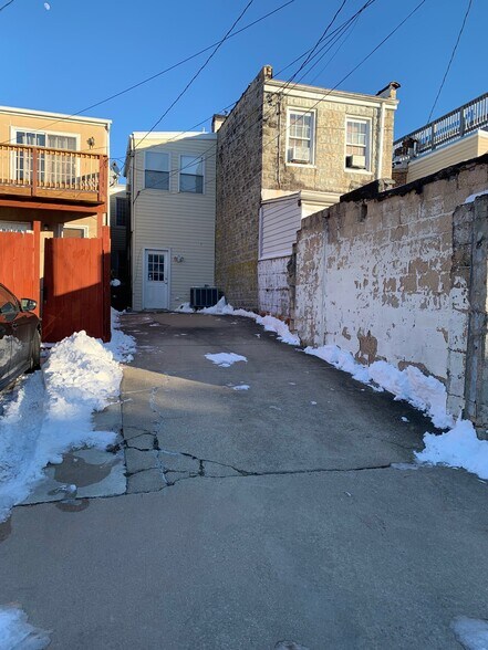Parking Pad in Rear Space for two cars - 18 S Castle St
