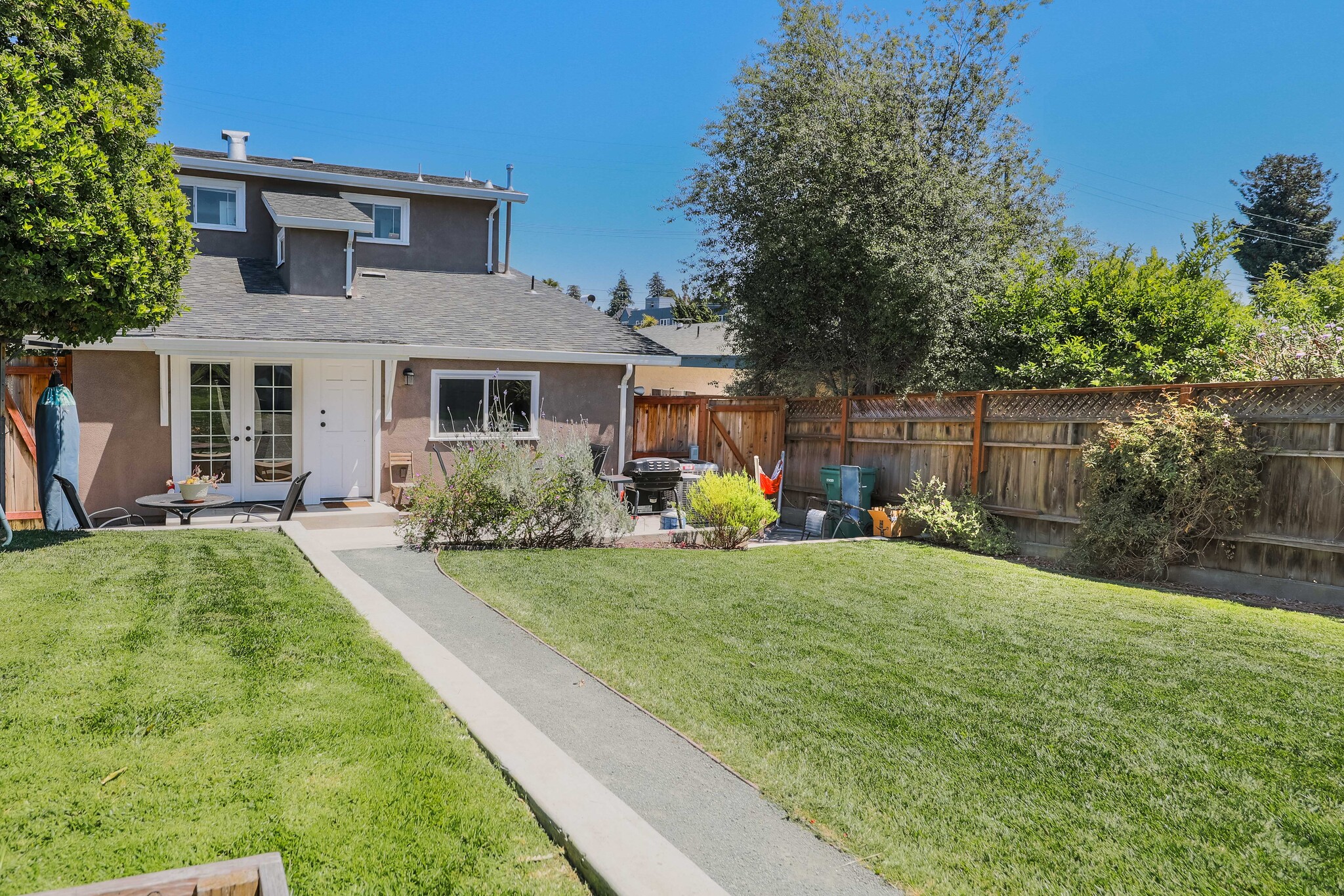 View of back yard and patio. - 431 Athol Ave